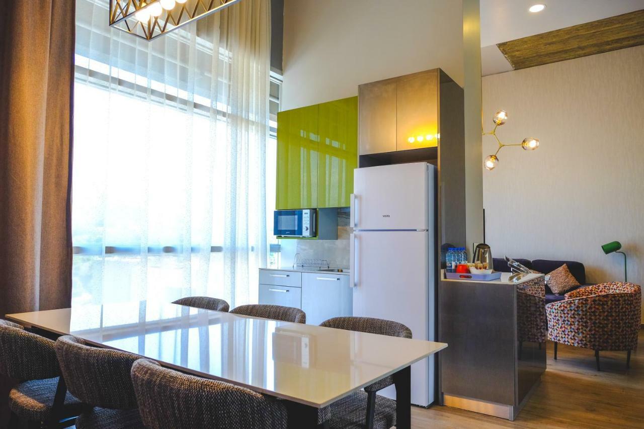 The Stay Furnished Apartments ดบาเยห์ ภายนอก รูปภาพ