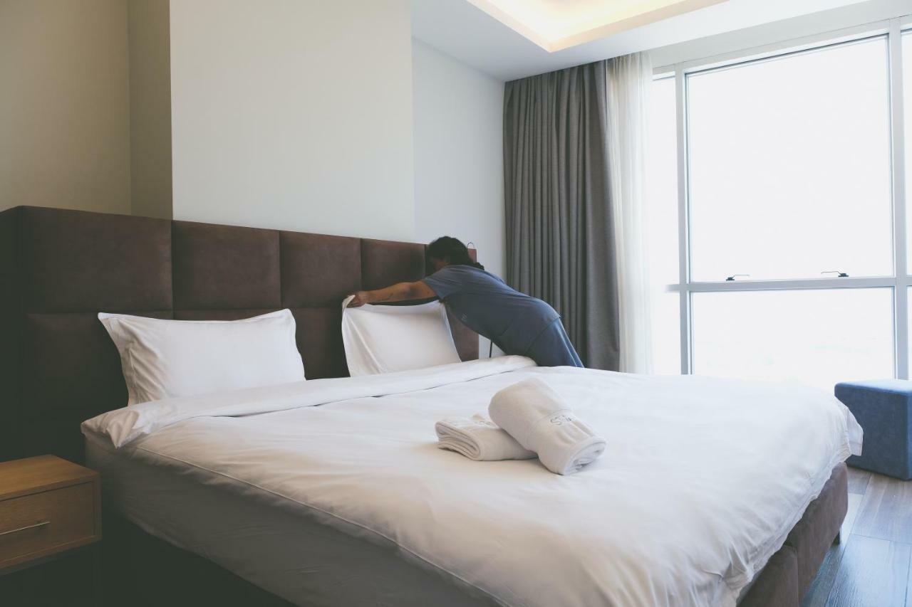 The Stay Furnished Apartments ดบาเยห์ ภายนอก รูปภาพ
